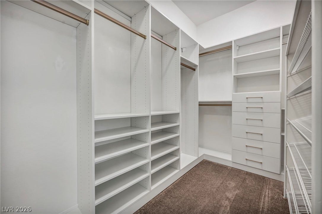 37 Stonemark Drive, Henderson, NV 89052 Spacious closet with dark colored carpet