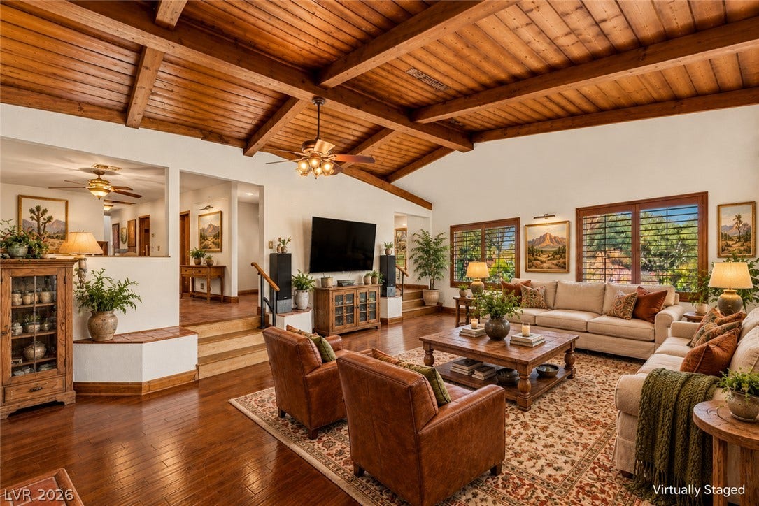 29 Cottonwood Drive, Blue Diamond, NV 89004 Rich wood plank ceilings and matching hardwood floors define this welcoming living space.