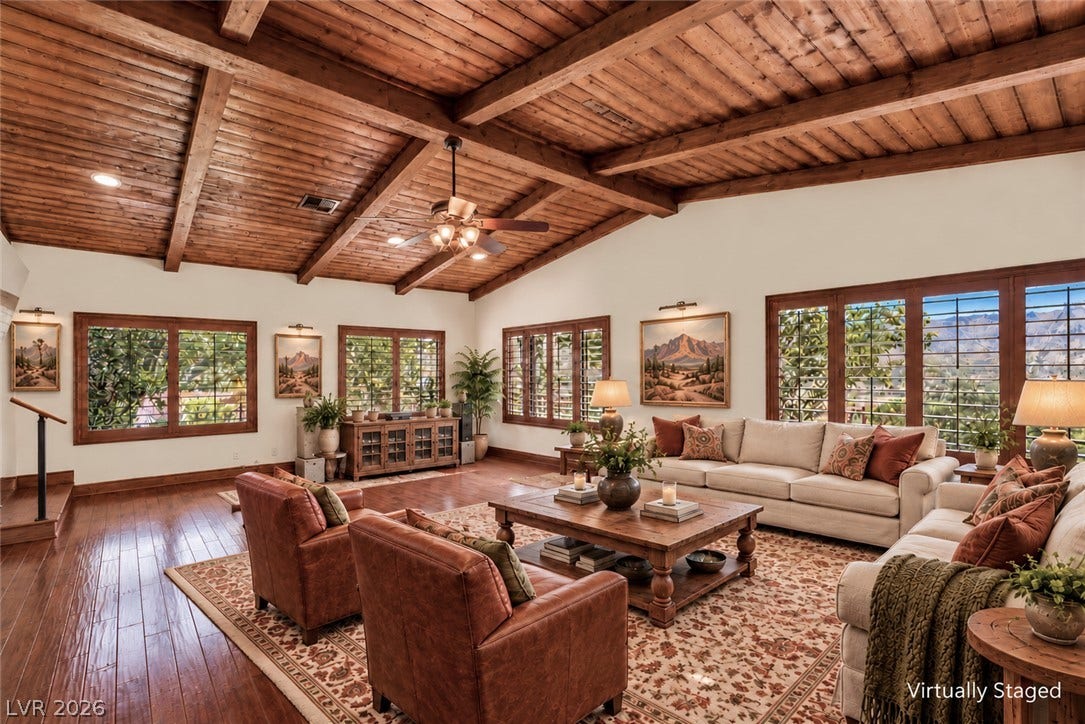 29 Cottonwood Drive, Blue Diamond, NV 89004 Rich wood floors and soaring beamed ceilings define this inviting living space.