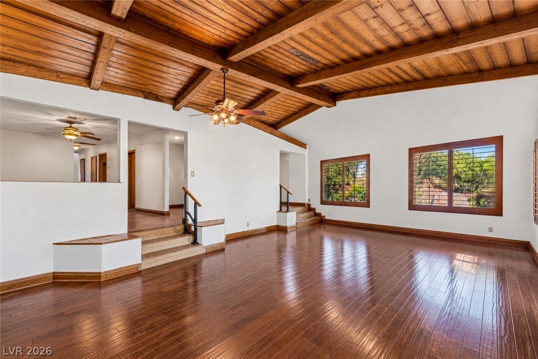 29 Cottonwood Drive, Blue Diamond, NV 89004 Gleaming hardwood floors and vaulted wood-beamed ceilings create a warm, inviting atmosphere.