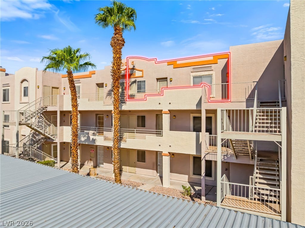 2036 Mesquite Lane, #303, Laughlin, NV 89029 Multi-level residential exterior showcases clean lines, stucco finishes, and integrated private balconies.
