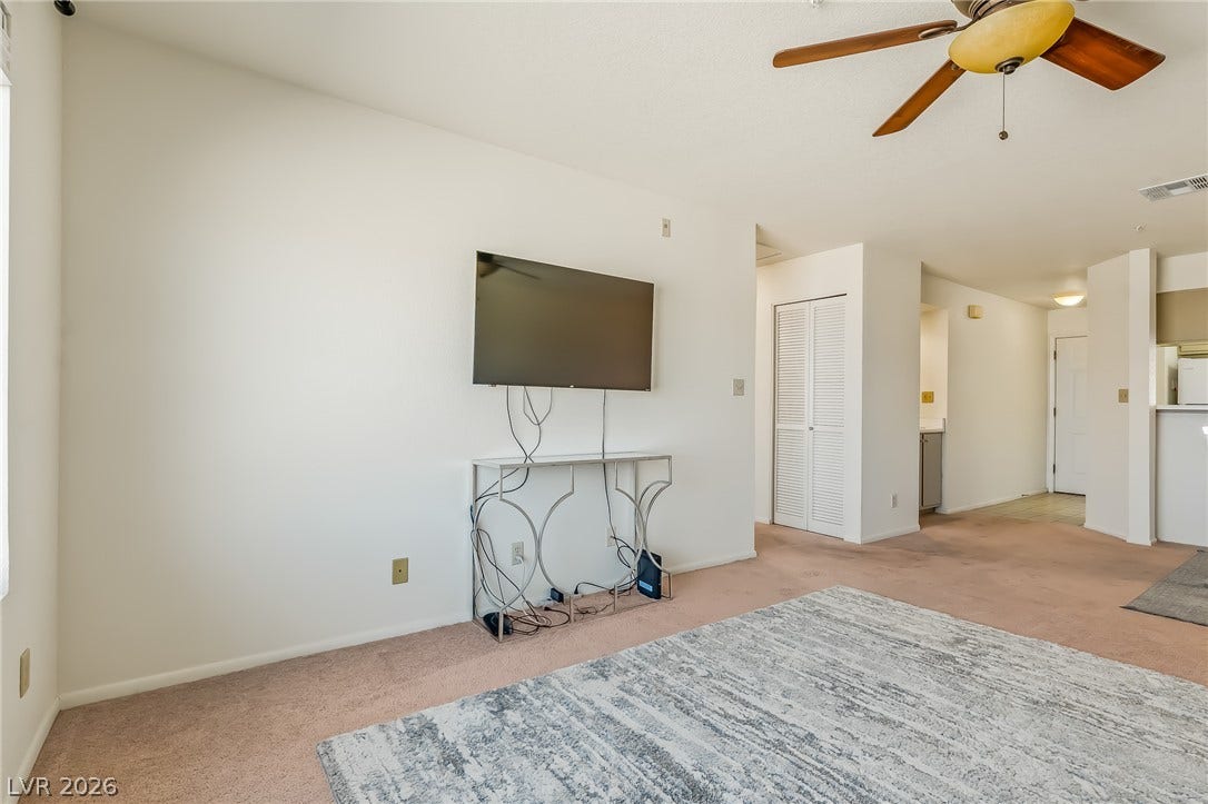 2036 Mesquite Lane, #303, Laughlin, NV 89029 Plush carpeting and an open layout define this versatile interior space.