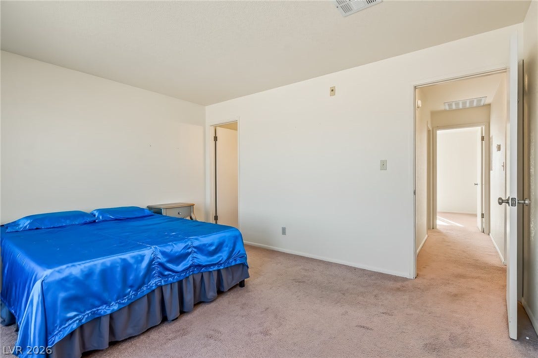 2036 Mesquite Lane, #303, Laughlin, NV 89029 Plush wall-to-wall carpeting complements the neutral palette of this tranquil sleeping space.