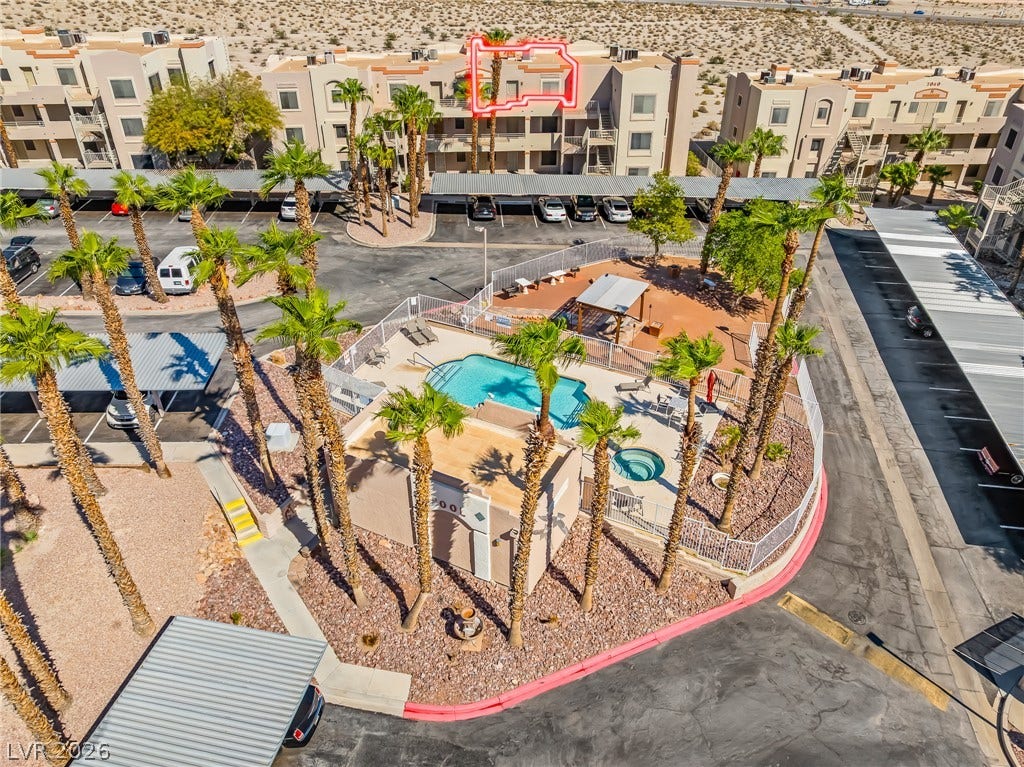 2036 Mesquite Lane, #303, Laughlin, NV 89029 An aerial perspective showcases the community amenities, featuring a swimming pool, spa, and covered parking.
