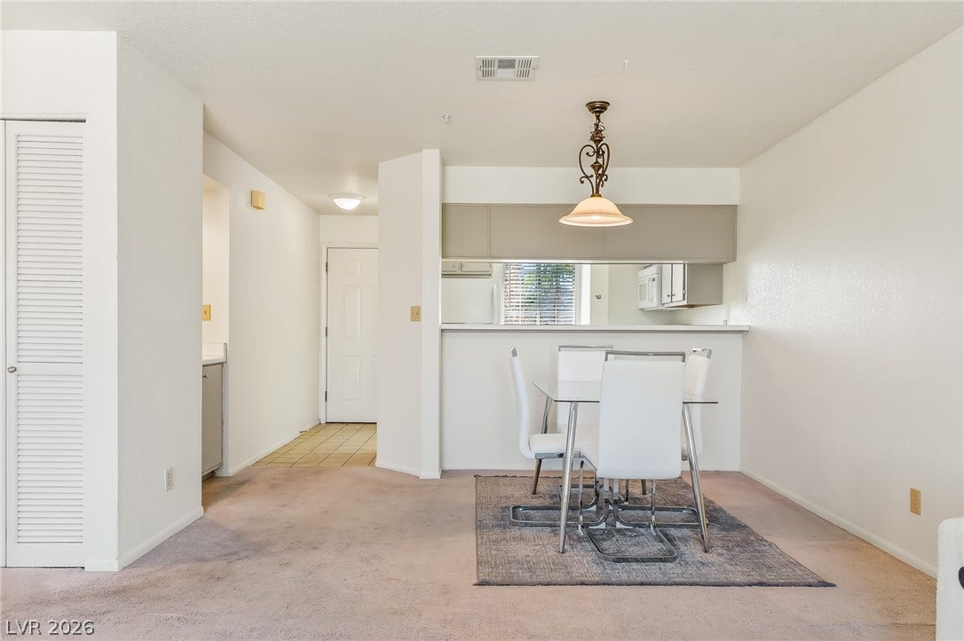 2036 Mesquite Lane, #303, Laughlin, NV 89029 An open dining area flows directly into the nearby kitchen space.