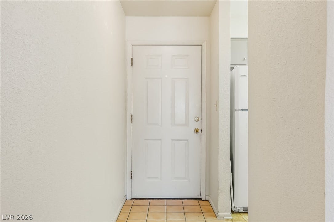 2036 Mesquite Lane, #303, Laughlin, NV 89029 A welcoming entryway features durable tile flooring and clean lines.