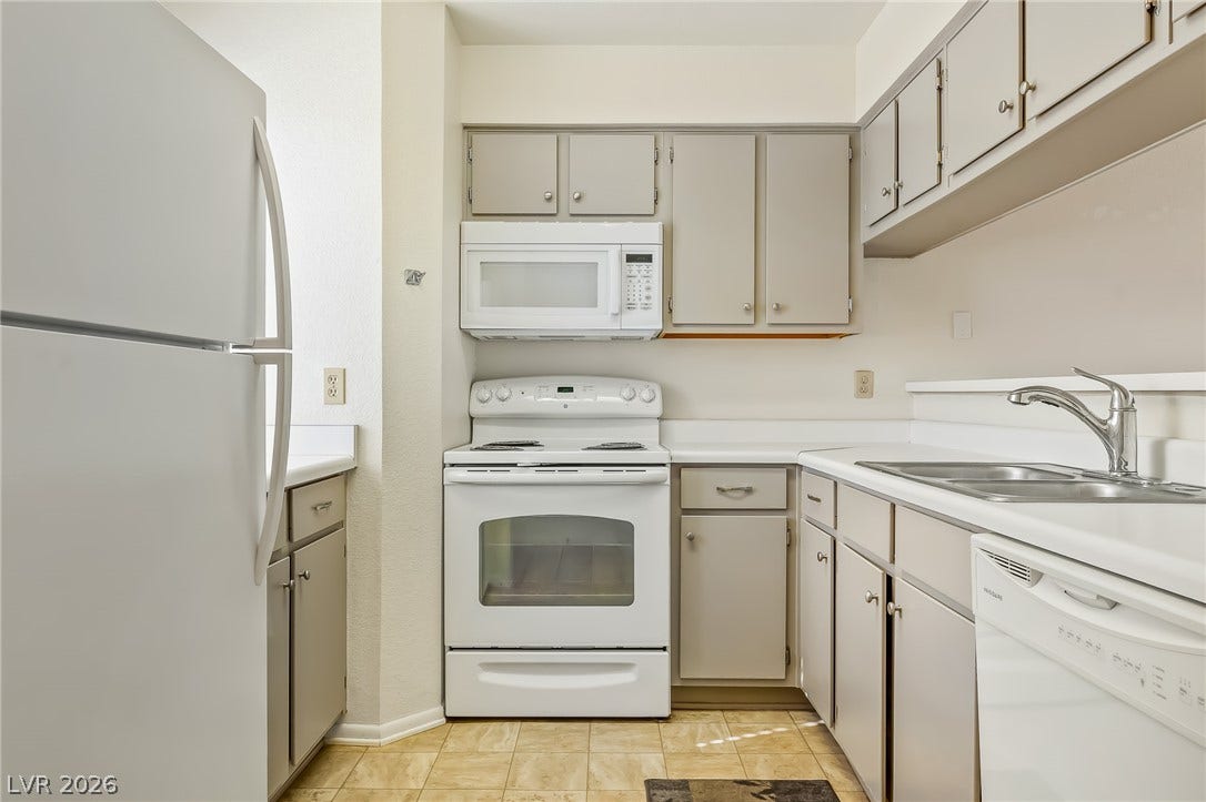 2036 Mesquite Lane, #303, Laughlin, NV 89029 Functional kitchen design showcases abundant cabinetry and expansive counter space.