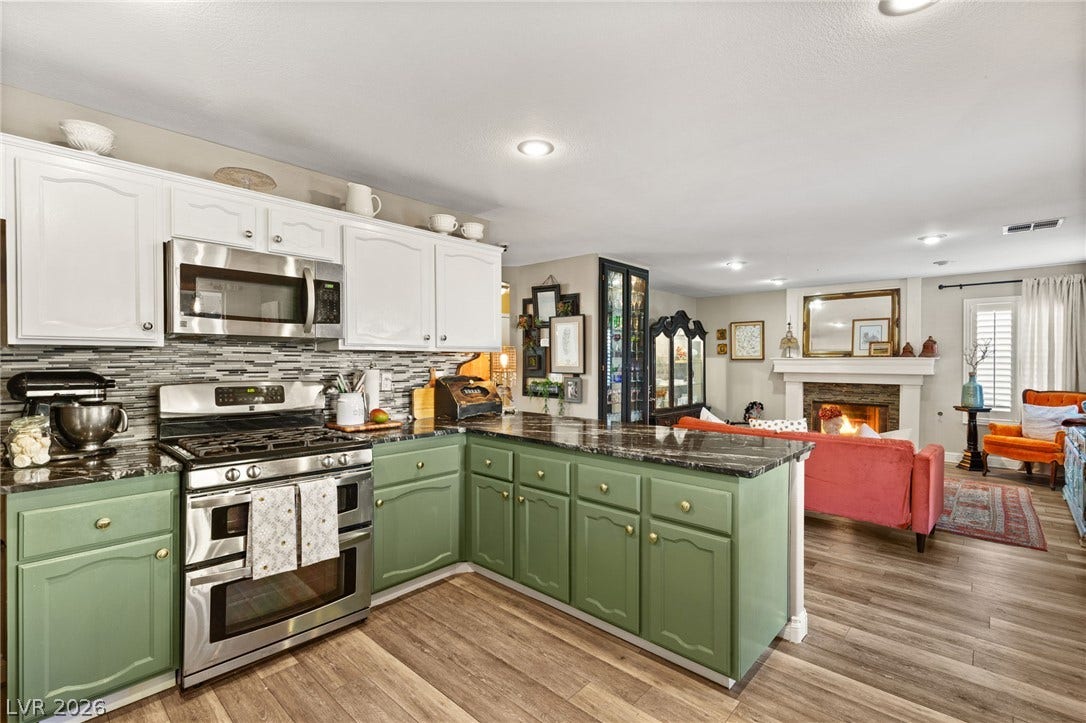 3950 Candleglow Court, Las Vegas, NV 89147 An open layout connects this functional kitchen to the adjoining living space.