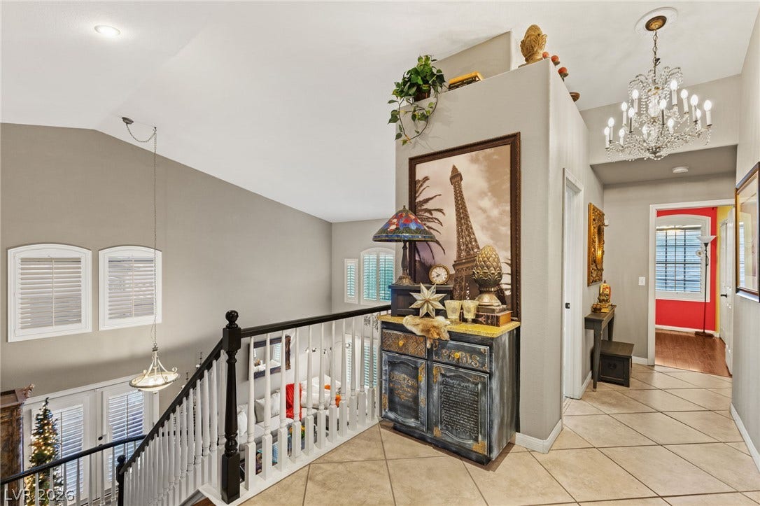 3950 Candleglow Court, Las Vegas, NV 89147 Vaulted ceilings and tile flooring enhance this open upper-level landing.