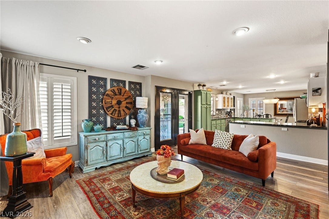 3950 Candleglow Court, Las Vegas, NV 89147 An open layout connects the comfortable living area directly to the kitchen.