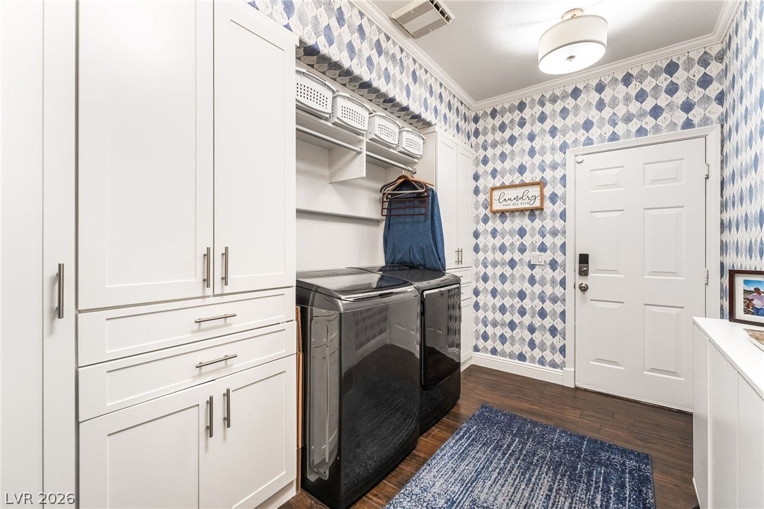 1892 Woodhaven Drive, Henderson, NV 89074 Ample cabinetry and modern appliances create an efficient and organized utility space.