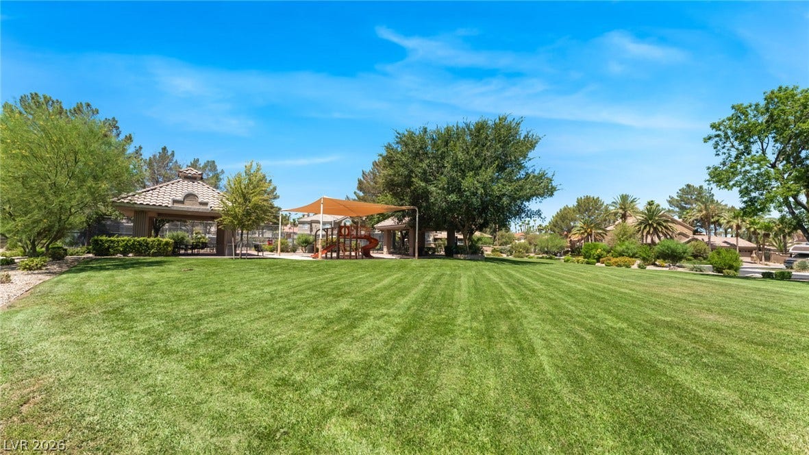 1892 Woodhaven Drive, Henderson, NV 89074 A community green space offers relaxation and recreation with a shaded playground and covered gazebo.