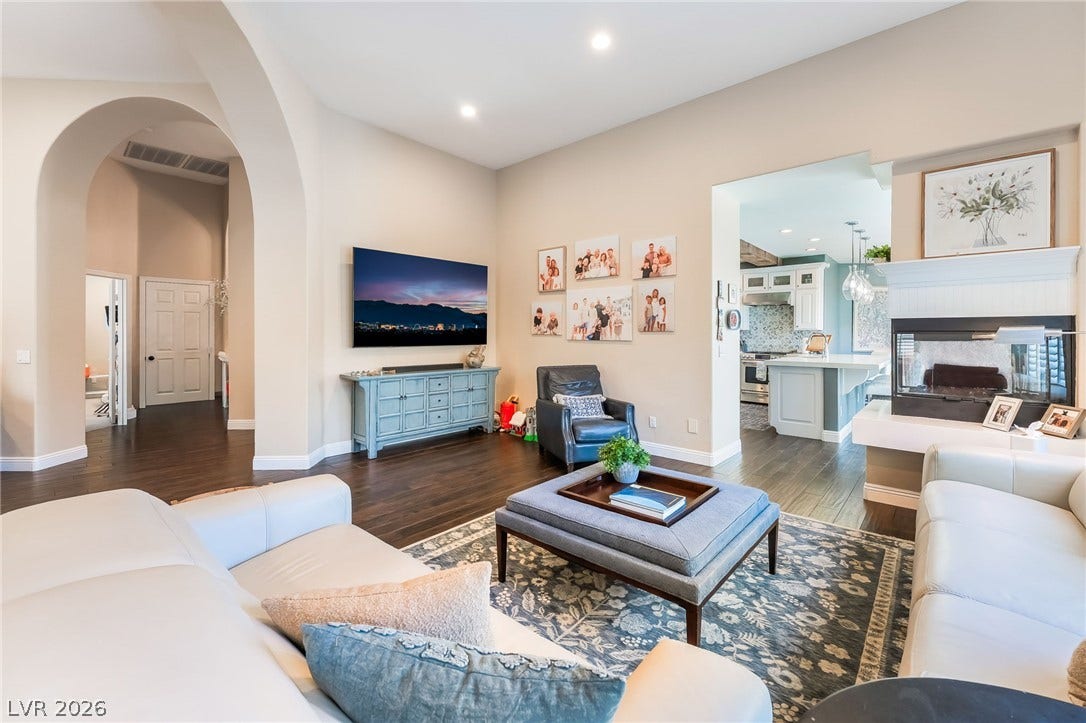 1892 Woodhaven Drive, Henderson, NV 89074 Hardwood floors and soaring vaulted ceilings define this inviting living space.