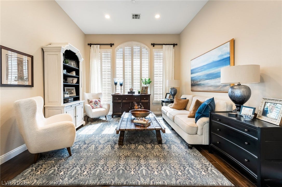 1892 Woodhaven Drive, Henderson, NV 89074 Hardwood floors and tall ceilings define this inviting and spacious living area.
