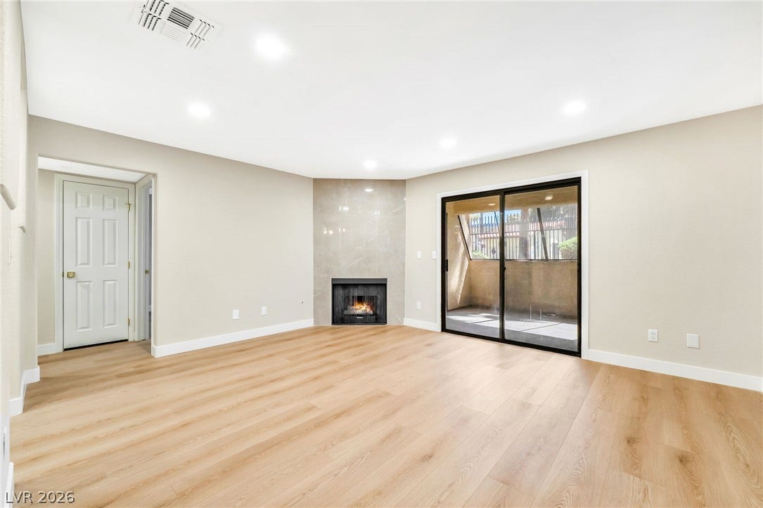 601 Cabrillo Circle, #431, Henderson, NV 89015 Sliding glass doors connect the light-filled living area to a private outdoor patio space.