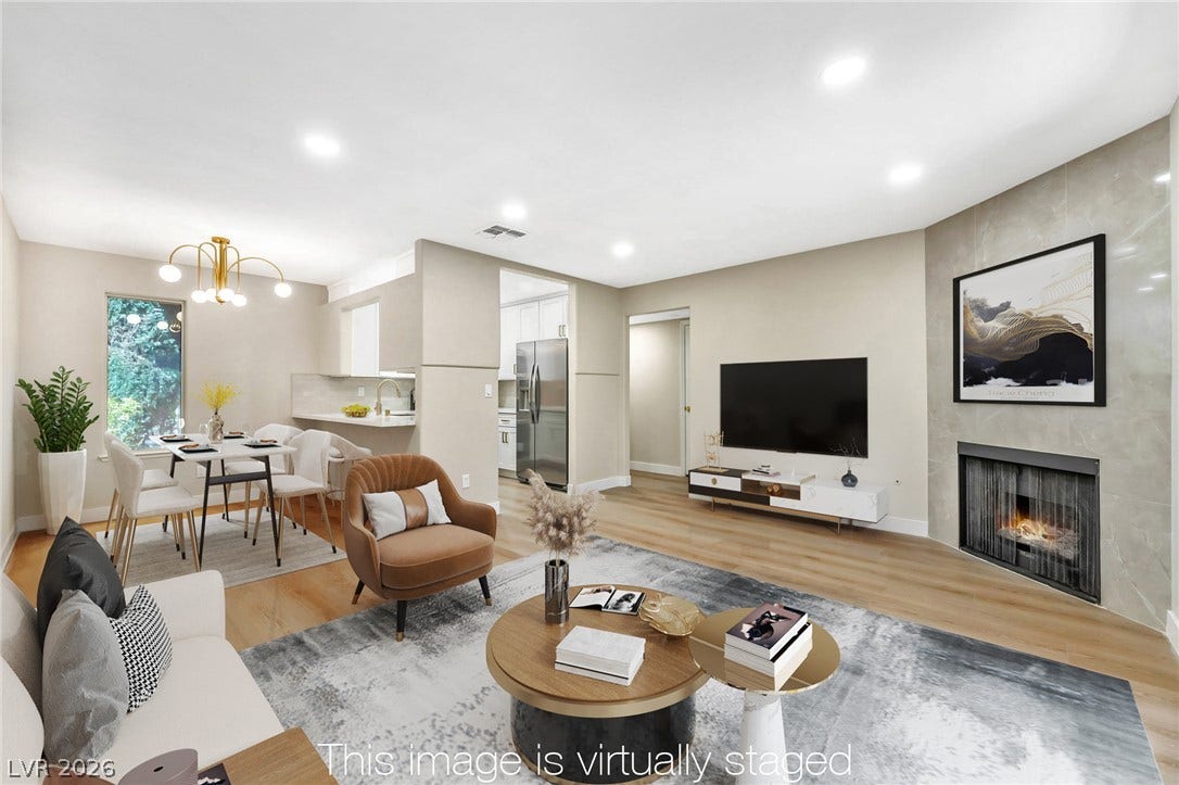 601 Cabrillo Circle, #431, Henderson, NV 89015 An open layout connects the living and dining areas accented by a modern fireplace.