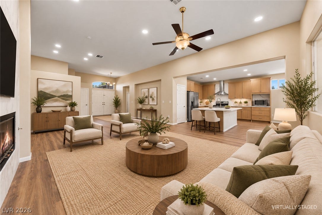 9613 Cherry Canyon Avenue, Las Vegas, NV 89129 High ceilings and warm wood floors define this open, airy living space.