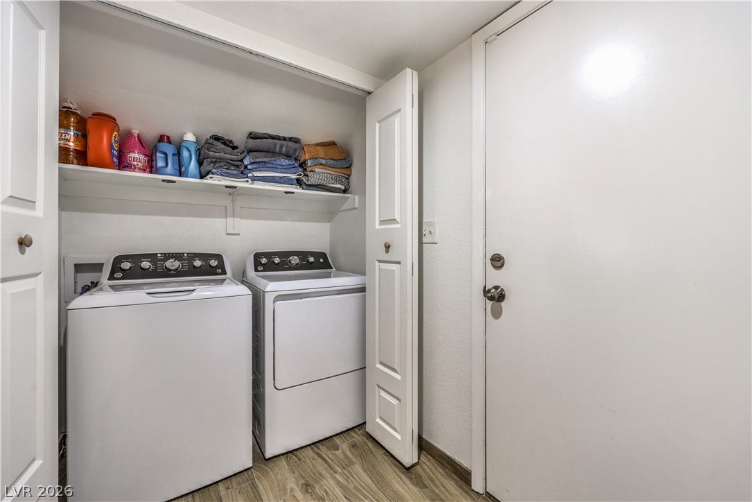 Functional layout organizes this utility area equipped with a practical storage shelf.