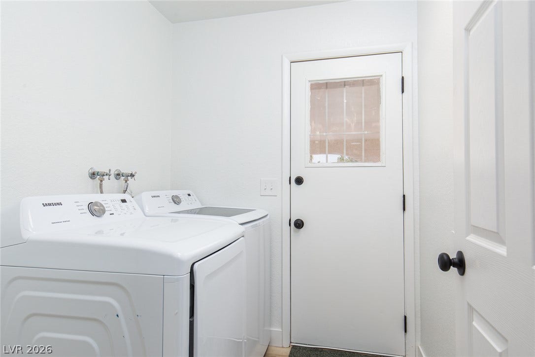 352 Lander Drive, Henderson, NV 89074 An organized laundry room offers essential utility and direct outdoor access.
