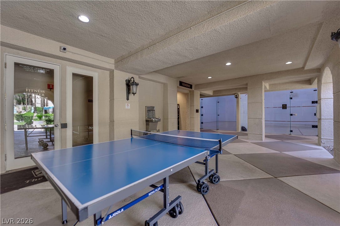 220 E Flamingo Road, #117, Las Vegas, NV 89169 A spacious covered recreation area provides space for games under a modern recessed ceiling.