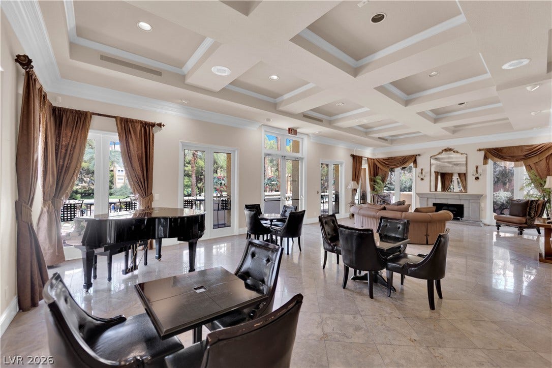 220 E Flamingo Road, #117, Las Vegas, NV 89169 Elegant coffered ceilings and polished tile flooring elevate this light-filled gathering space.