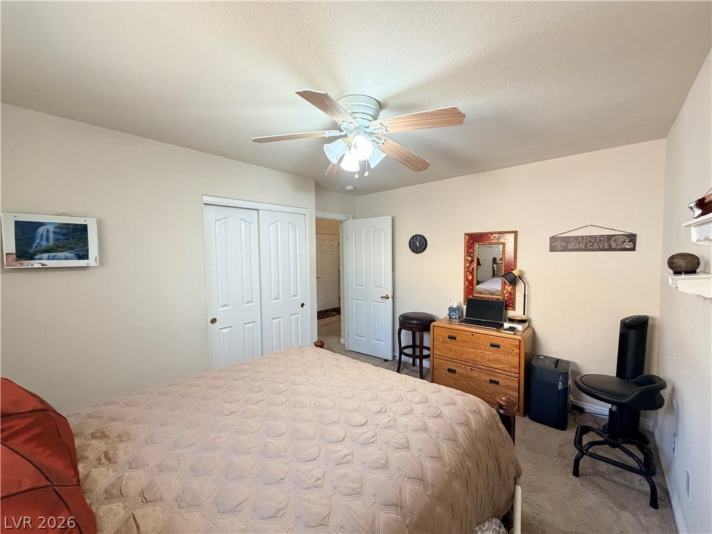 3917 Robin Knot Court, North Las Vegas, NV 89084 Soft carpeting pairs with smooth neutral walls in this comfortable secondary bedroom.