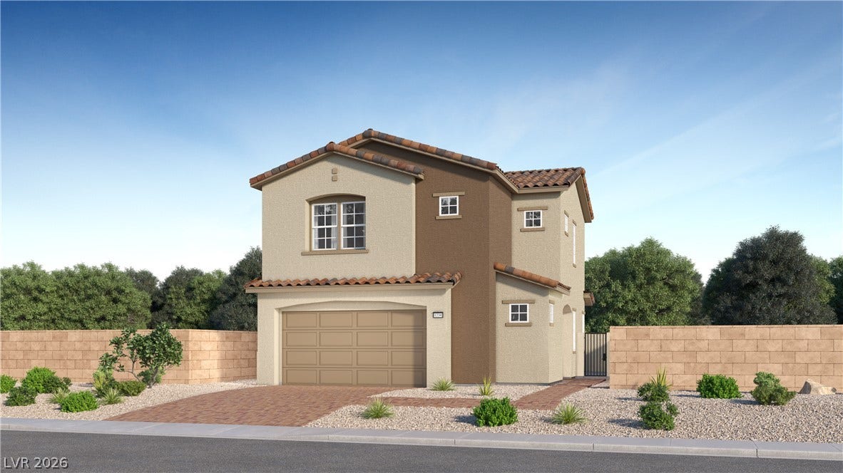 306 Crescent Glow Lane, Henderson, NV 89015 A classic Spanish tile roof crowns this beautiful two-story exterior featuring stucco finishes.