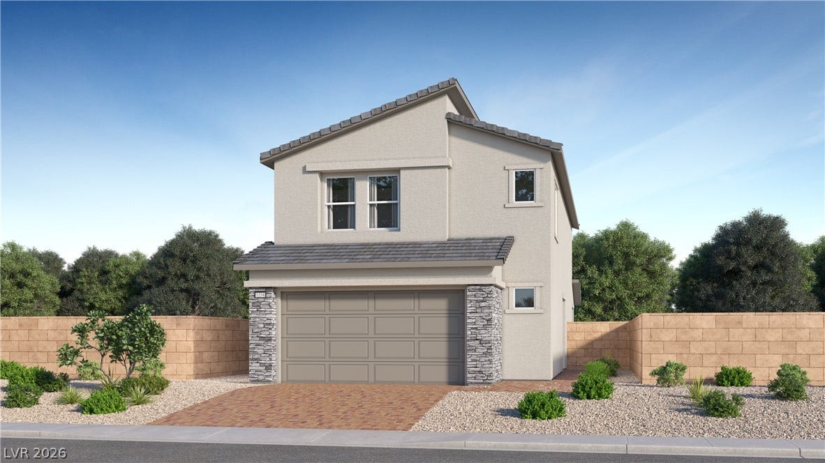 A modern two-story exterior highlights clean architectural lines, stone accents, and low-maintenance desert landscaping.