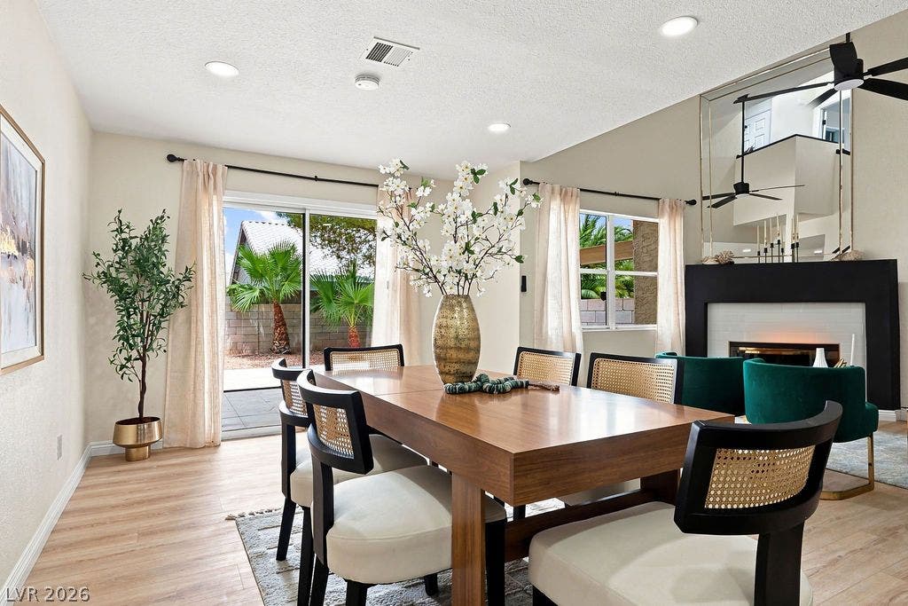 6250 W Flamingo Road, #62, Las Vegas, NV 89103 Beautifully updated open-concept dining/living area featuring fresh new paint and brand-new vinyl plank flooring.