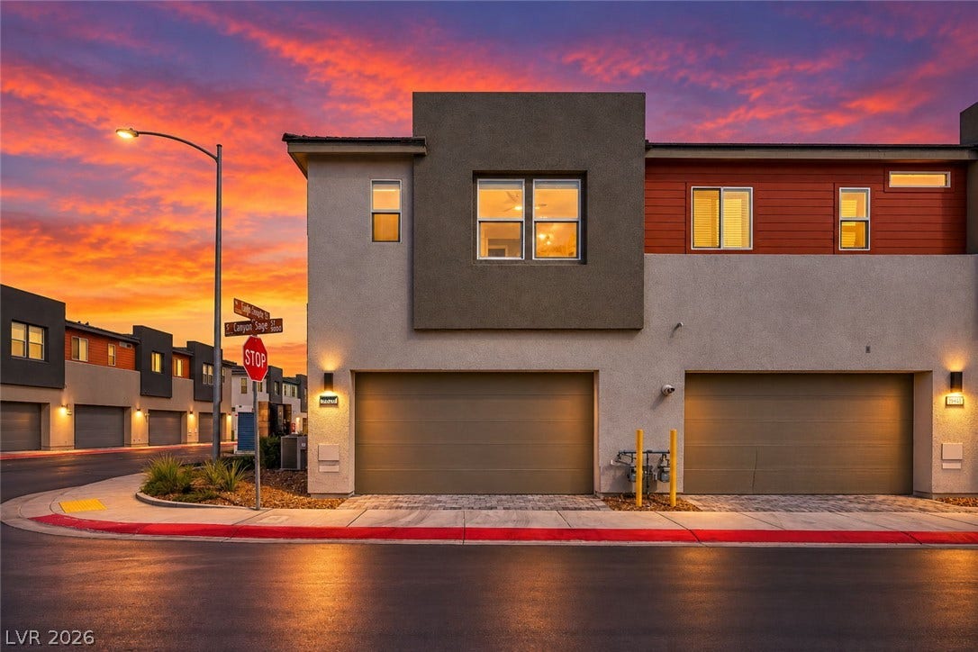 9826 Canyon Sage Street, Las Vegas, NV 89141 Modern multi-level exterior architecture features clean lines and integrated garage access on a corner lot.
