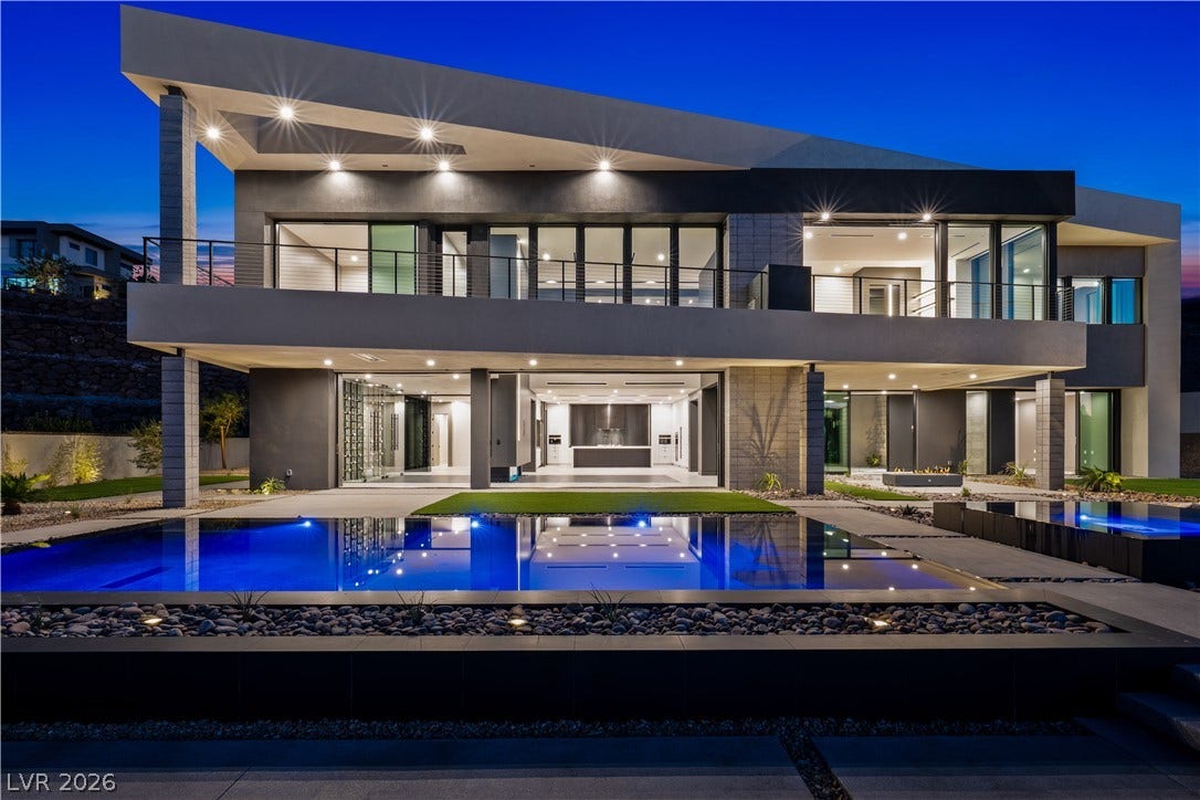 25 Boulderback Drive, Henderson, NV 89012 Bold geometric lines and an illuminated pool define this ultra-modern two-story architectural masterpiece.