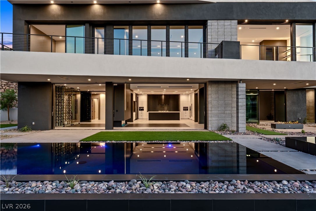 25 Boulderback Drive, Henderson, NV 89012 Sleek architectural lines frame the ultimate indoor-outdoor living experience poolside.