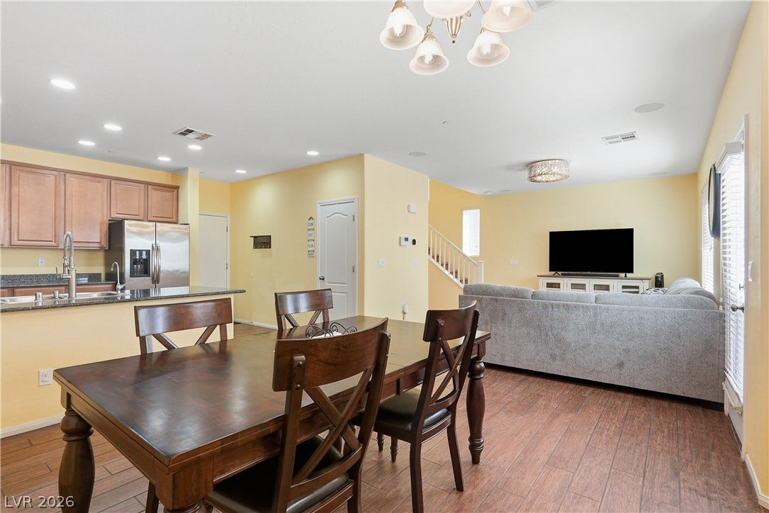 An open concept design connects the dining area directly to the living room and kitchen.