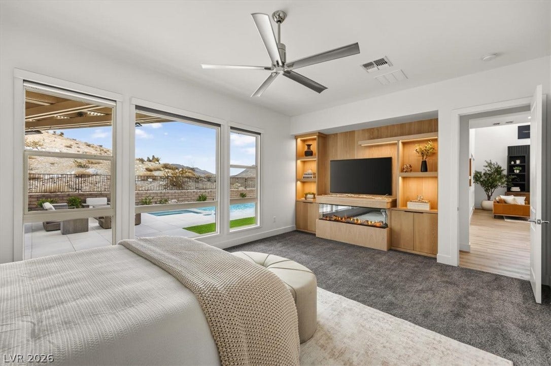 2611 Nevada Agave Lane, Las Vegas, NV 89138 Richly textured carpet and custom built-in cabinetry define this serene private sanctuary.