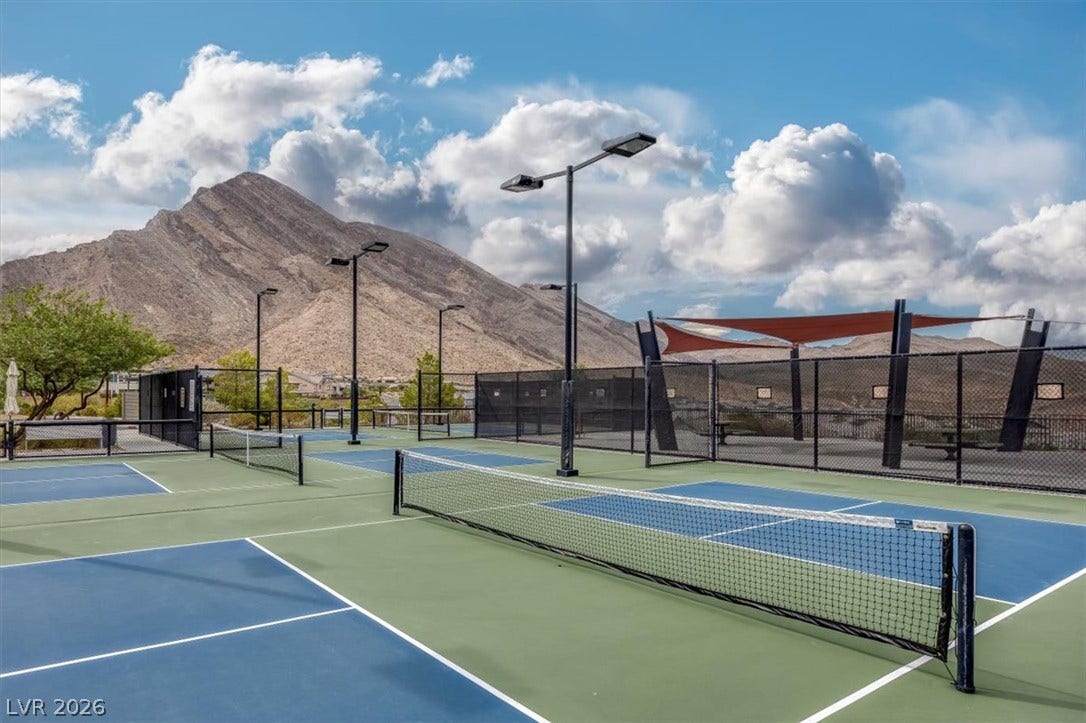 2611 Nevada Agave Lane, Las Vegas, NV 89138 Professional-grade courts offer recreation against a dramatic mountain backdrop.
