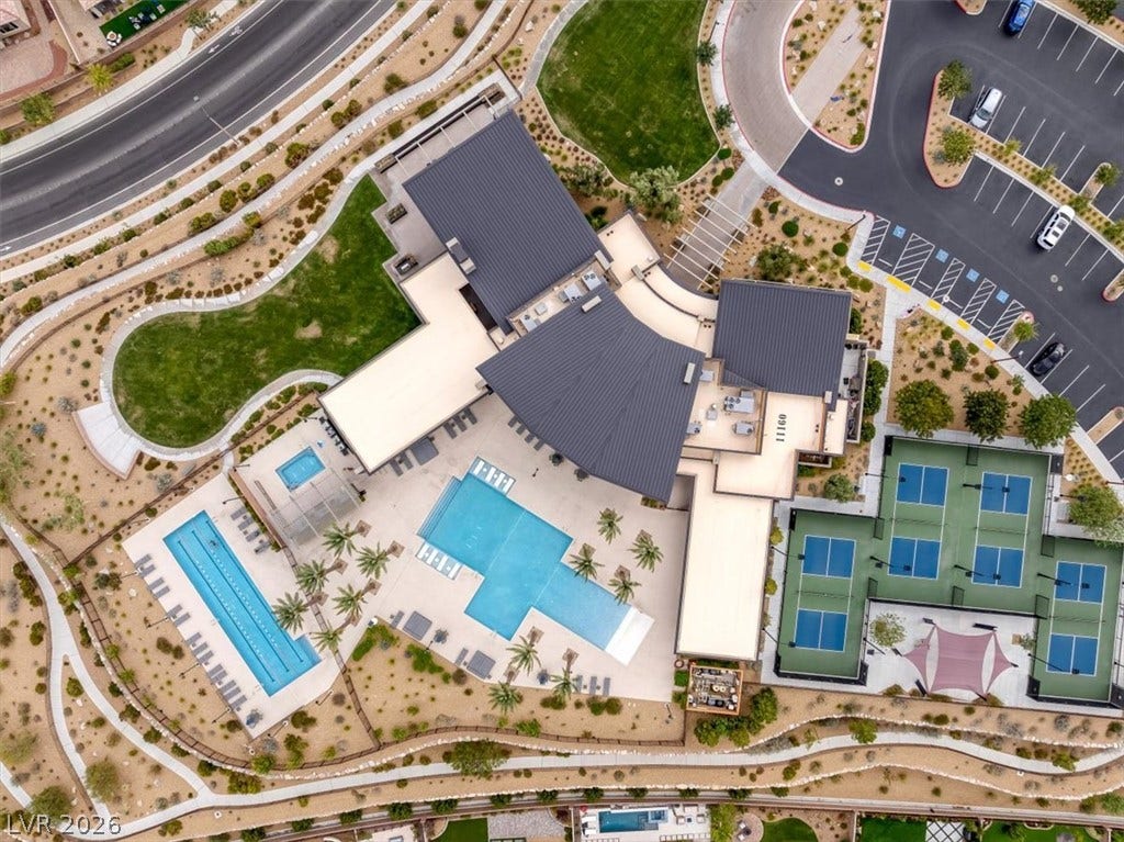 2611 Nevada Agave Lane, Las Vegas, NV 89138 An aerial view showcases premier community recreation facilities including pools and sport courts.