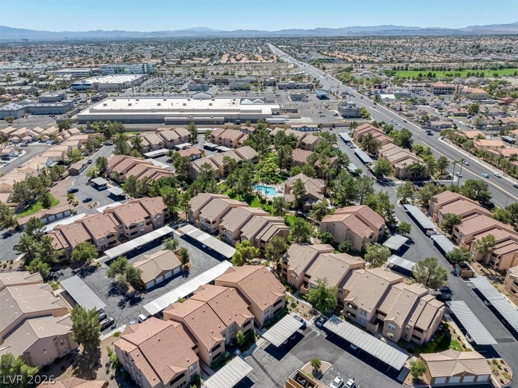 An aerial perspective showcases the beautifully planned residential community nestled near mountain vistas.