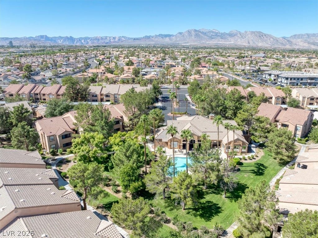 Majestic mountain ridges provide a dramatic backdrop for this lush, palm-lined residential enclave.