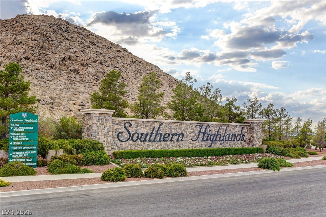 89 Olympia Chase Drive, Las Vegas, NV 89141 An impressive stone entry monument welcomes residents to the master-planned neighborhood.
