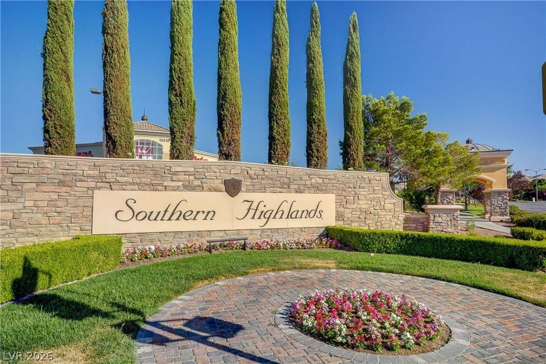 89 Olympia Chase Drive, Las Vegas, NV 89141 An elegant stone entry monument and manicured pathways welcome residents to this desirable community.