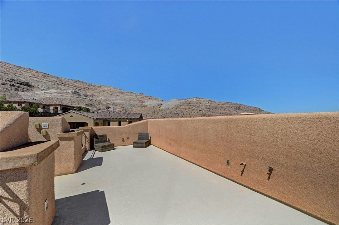 89 Olympia Chase Drive, Las Vegas, NV 89141 Take in sweeping mountain vistas from this spacious rooftop terrace.