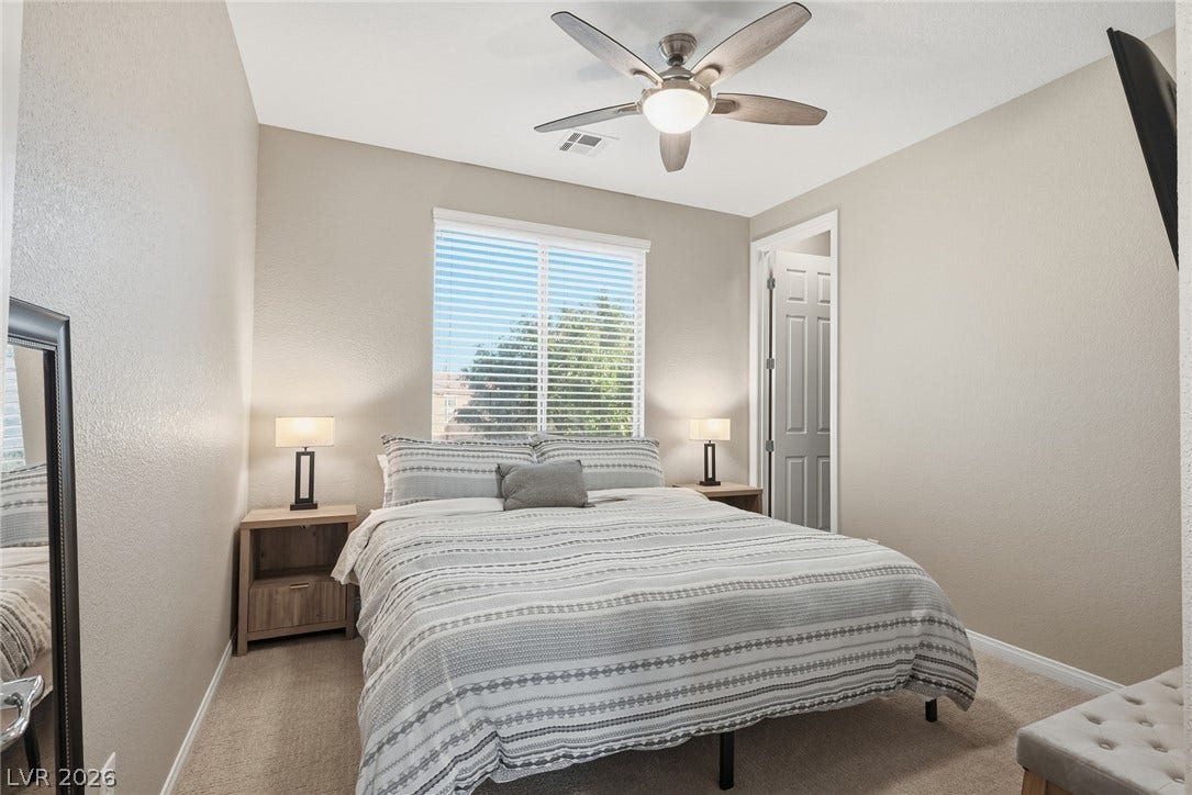 Bedroom 4-Plush carpeting and abundant natural light create a welcoming and comfortable retreat.