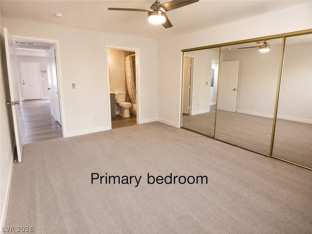 Plush carpeting and mirrored closets enhance this master suite featuring direct bathroom access.