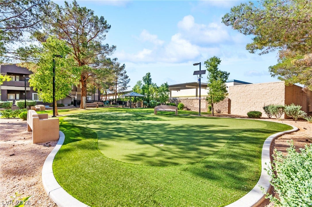 5250 S Rainbow Boulevard, #2033, Las Vegas, NV 89118 Lush manicured putting green highlights this community park area under open skies.