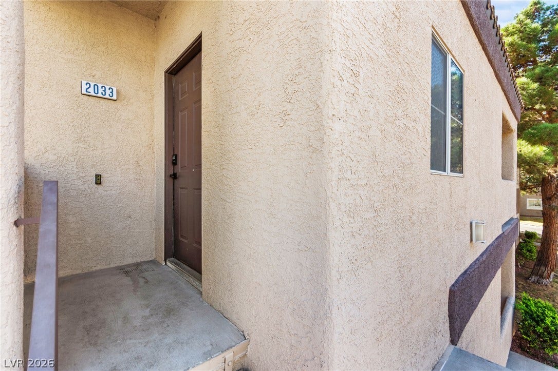 5250 S Rainbow Boulevard, #2033, Las Vegas, NV 89118 An inviting private entrance sits at the top of concrete stairs.
