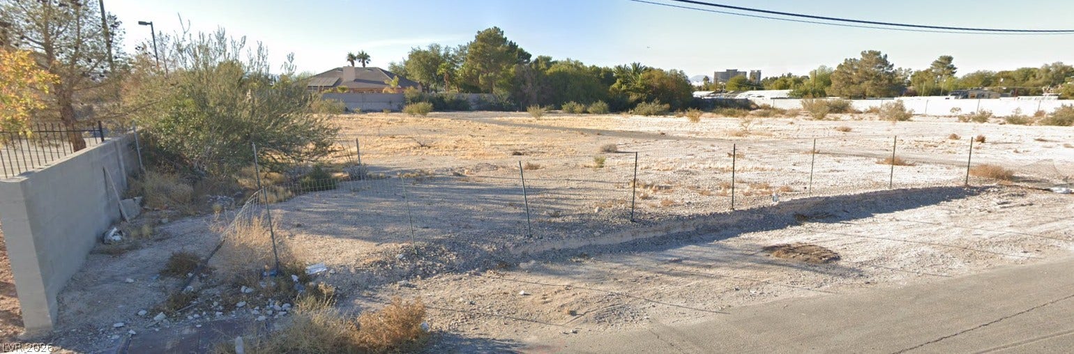 Gilespie Street, Las Vegas, NV 89123 An expansive level lot presents a blank canvas with mountain views in the distance.