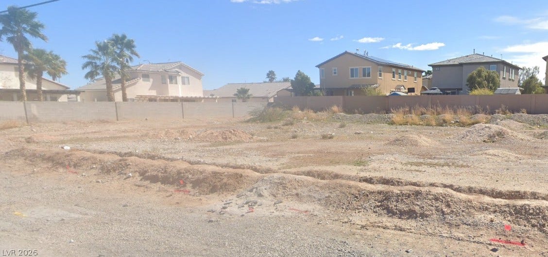 Gowan Road, North Las Vegas, NV 89032 A spacious residential lot awaits construction within an established suburban neighborhood.