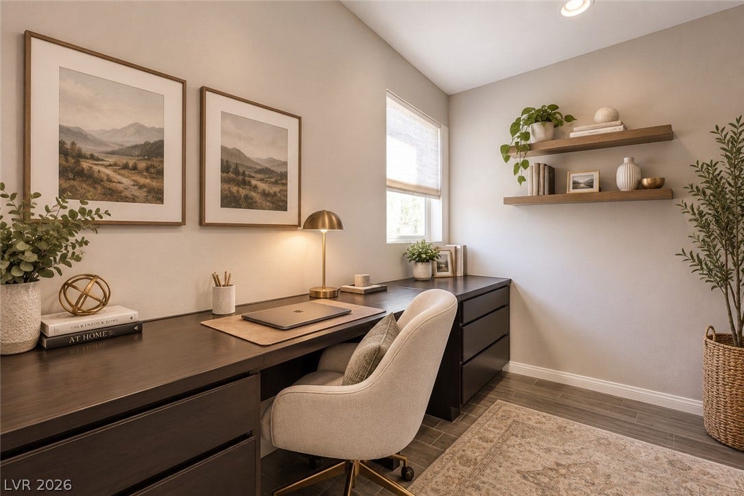 413 Via Gigante, Henderson, NV 89011 Virtually Stage: spacious built-in desk off the kitchen with floating shelves highlight this quiet home office space.