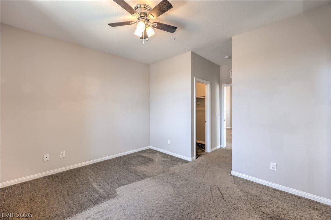 413 Via Gigante, Henderson, NV 89011 A quiet retreat with comfortable carpeting, ready for personalization.