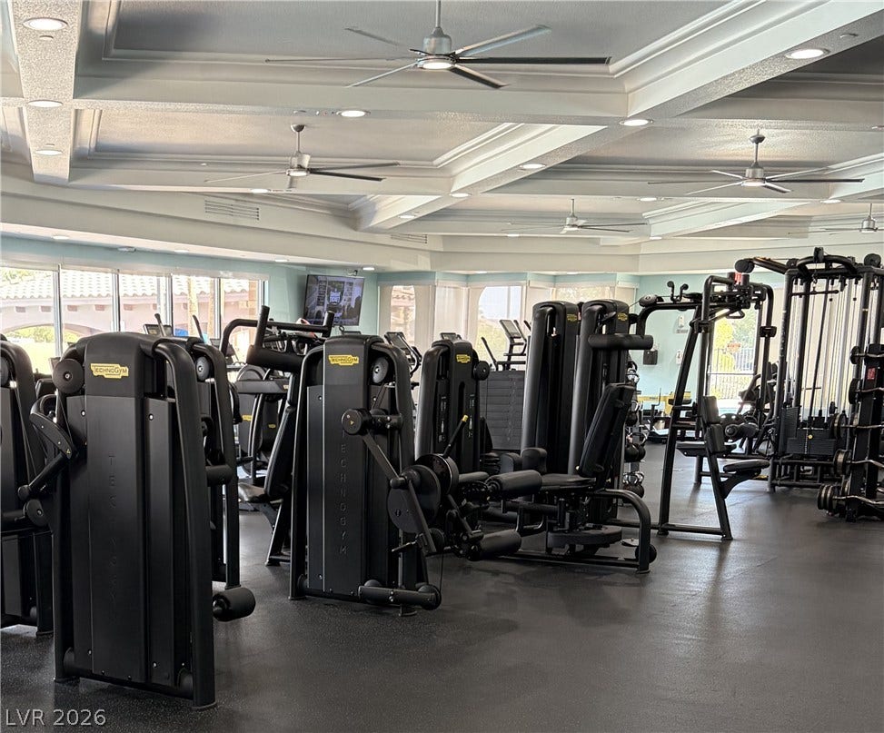 413 Via Gigante, Henderson, NV 89011 Coffered ceilings with recessed lighting frame this well-equipped workout space.